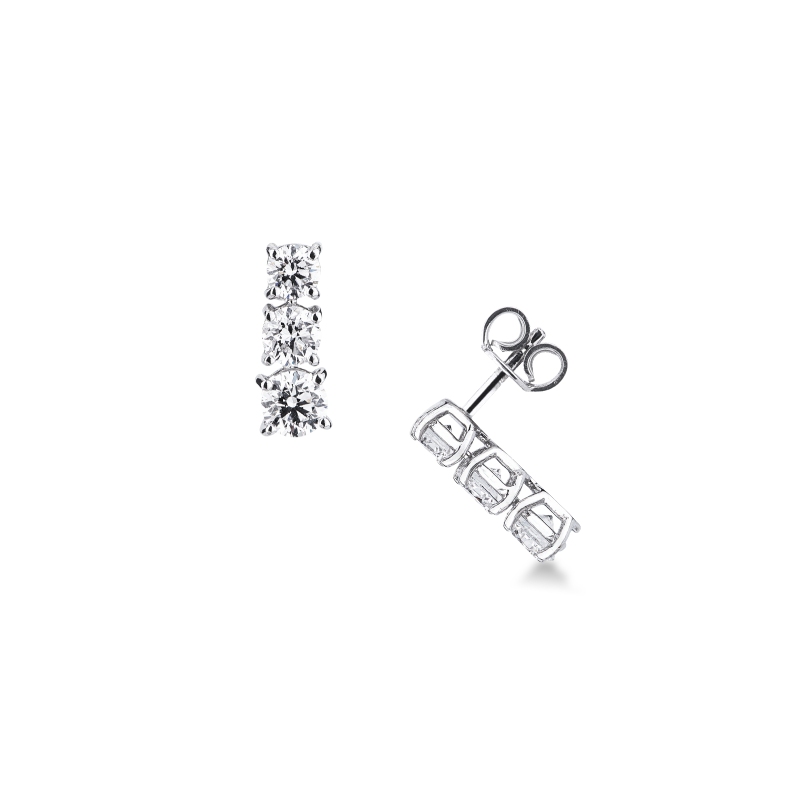 Orecchini trilogy a scalare in oro bianco 750 con diamanti