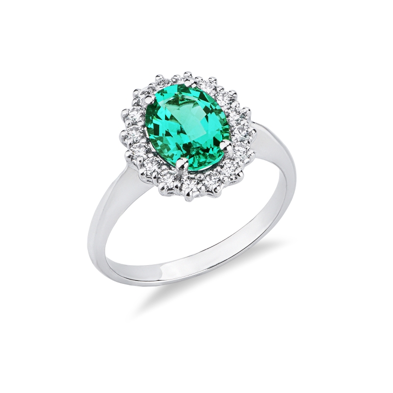 ANELLO CONTORNO CON 16BRILLANTI E SMERALDO OVALE MM9X7