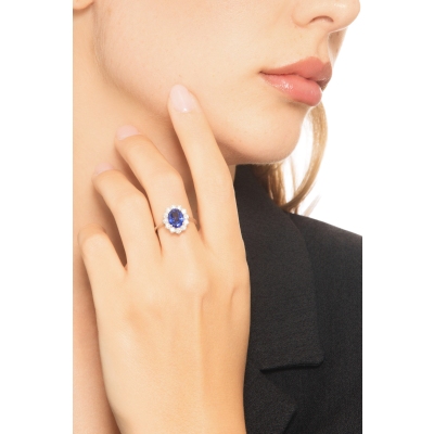 Anello contorno oro bianco 18k con zaffiro blu e diamanti