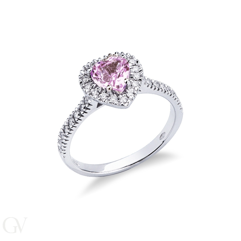 White gold 18k halo ring with a heart shaped pink sapphire of about 6mm and diamonds