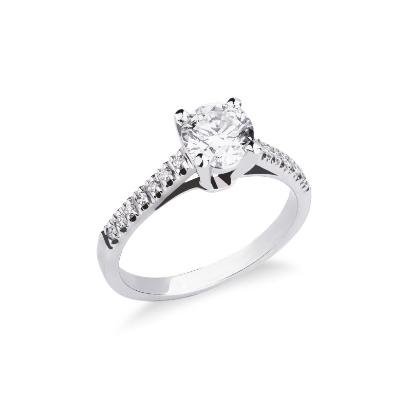 White gold 18k ring with a 0,50 ct diamond and diamond shoulder set