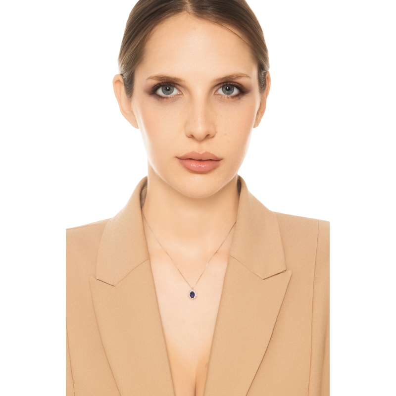 Collana rosetta zaffiro blu e diamanti in oro bianco 18k
