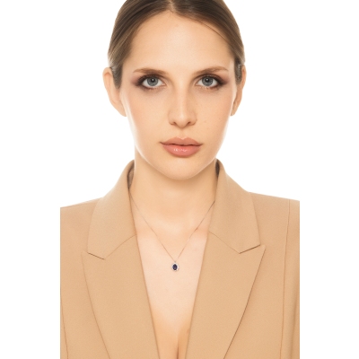Collana rosetta zaffiro blu e diamanti in oro bianco 18k