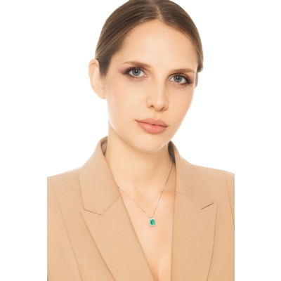 Necklace with pendant, emerald and round cut diamonds