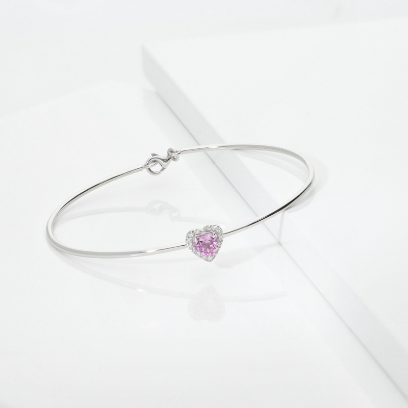 Bracciale rigido con zaffiro rosa a cuore e diamanti in oro bianco 750