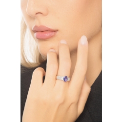 White gold 18k ring with central tanzanite and three diamonds rows 2
