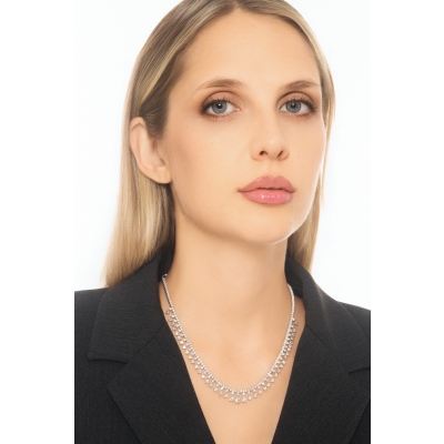 Girocollo tennis design in oro bianco 18k con griffe pendenti in diamanti