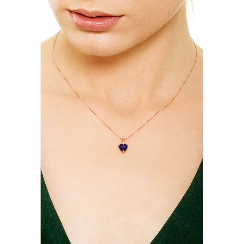 18k rose gold necklace with heart shape sapphire and a diamond
