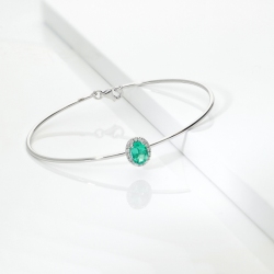 BRACCIALE RIGIDO CON CONTORNO IN BRILL E SMERALDO OVALE MM7X5