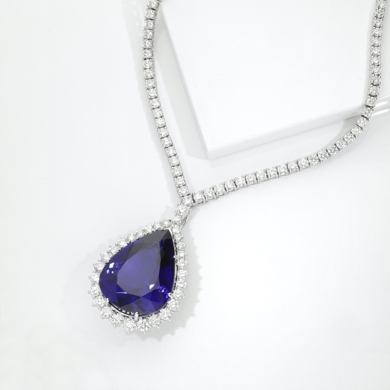 Collana tennis oro bianco 18k con tanzanite a goccia e diamanti