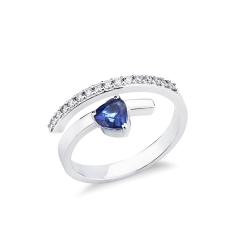 Anello contrariè con diamanti e zaffiro blu a cuore oro bianco