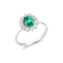 ANELLO CONTORNO CON 12BRILLANTI E SMERALDO OVALE MM7X5