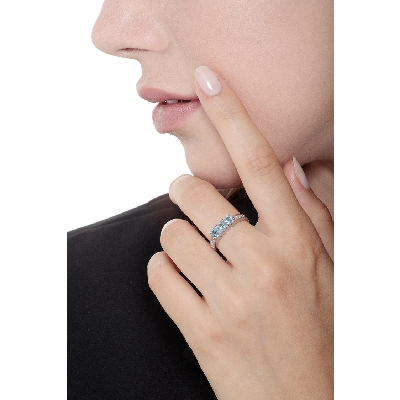 White gold 18k trilogy ring with diamonds and aquamarines