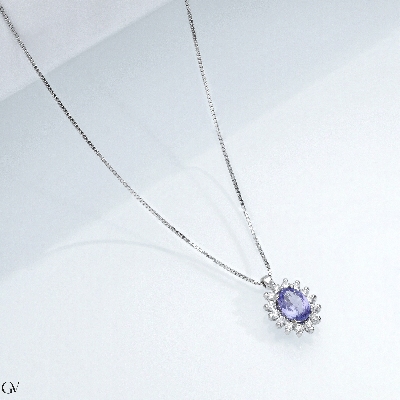 Necklace in white gold 18k with diamonds and tanzanite oval cut