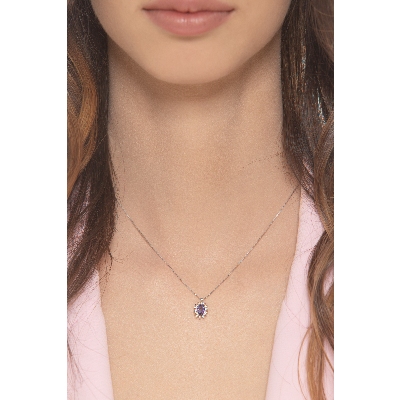 Necklace in white gold 18k with diamonds and tanzanite oval cut