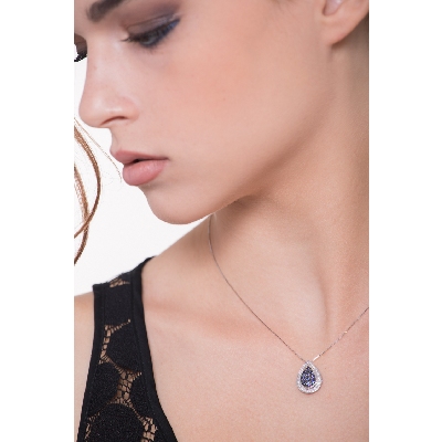 18k white gold burnished oval pendant wit sapphires and diamonds