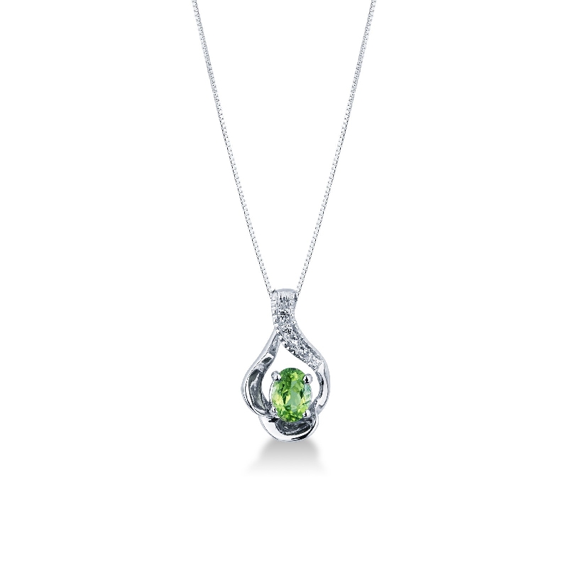 White gold 18k pendant with diamonds and peridot