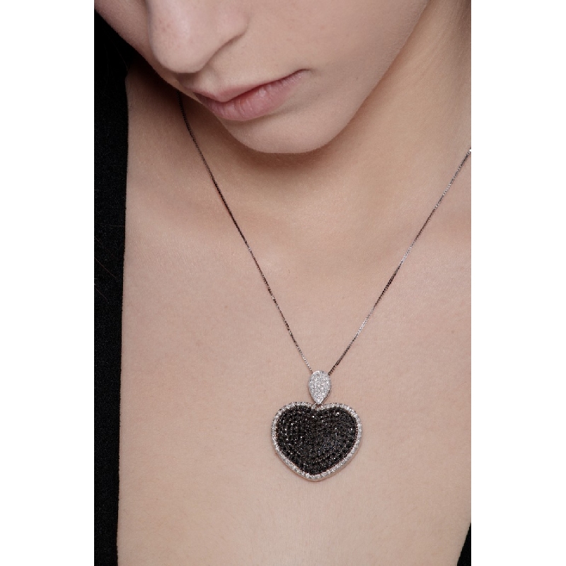 18k white gold necklace with heart pendant with black and white diamonds