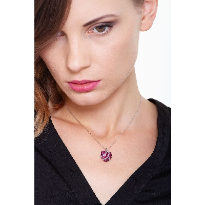 Burnished heart pendant with rubies and diamonds