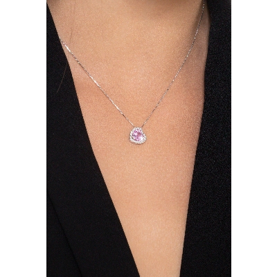 Necklace with inclined pendant, central pink sapphire and diamonds