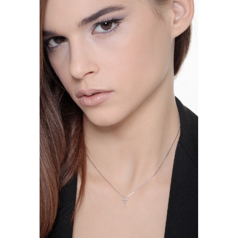 18k white gold thin cross pendant with round cut diamonds