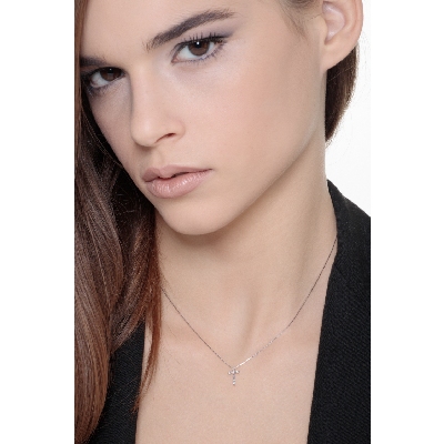 18k white gold thin cross pendant with round cut diamonds