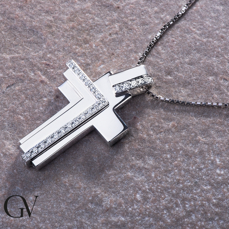 Fancy style cross pendant with diamonds