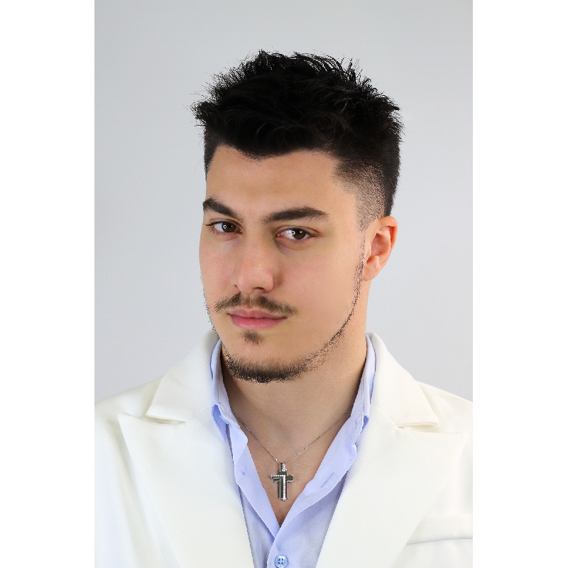 Fancy style cross pendant with diamonds