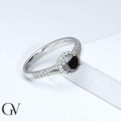Solitaire type ring with black central diamond and halo and shoulder set diamonds 