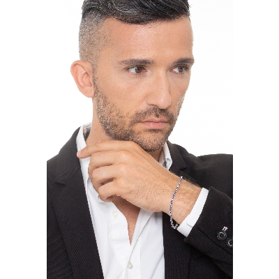 Wire style tennis bracelet with blue sapphires and diamonds