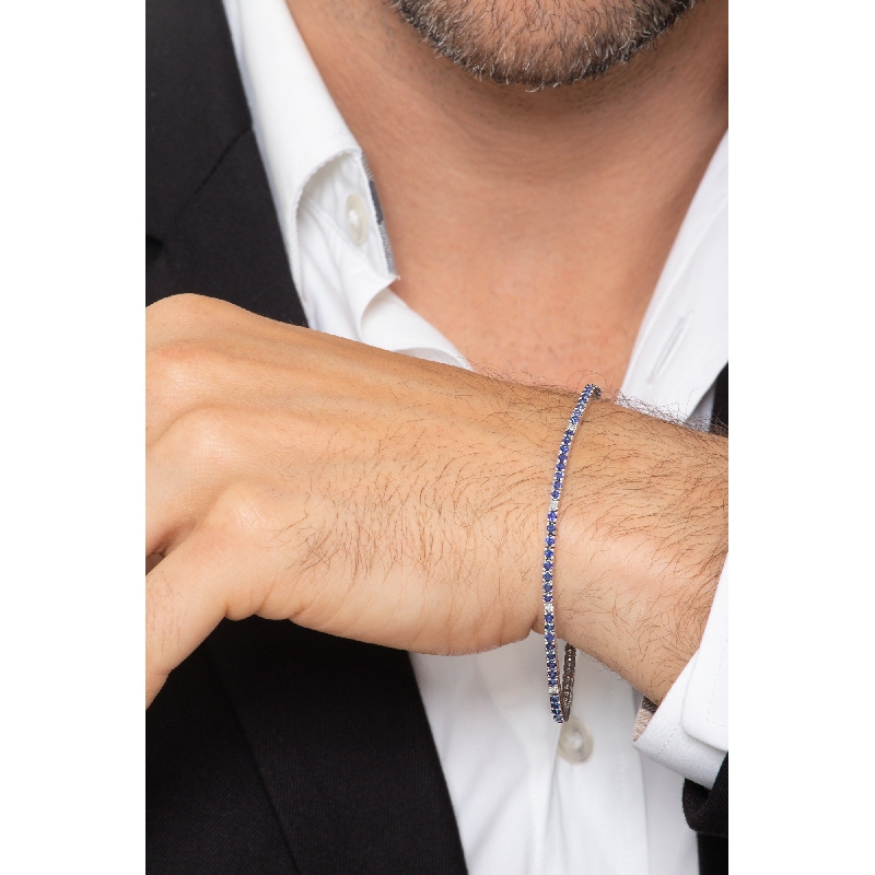 Wire style tennis bracelet with blue sapphires and diamonds