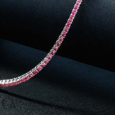 Wire top tennis bracelet with rubies