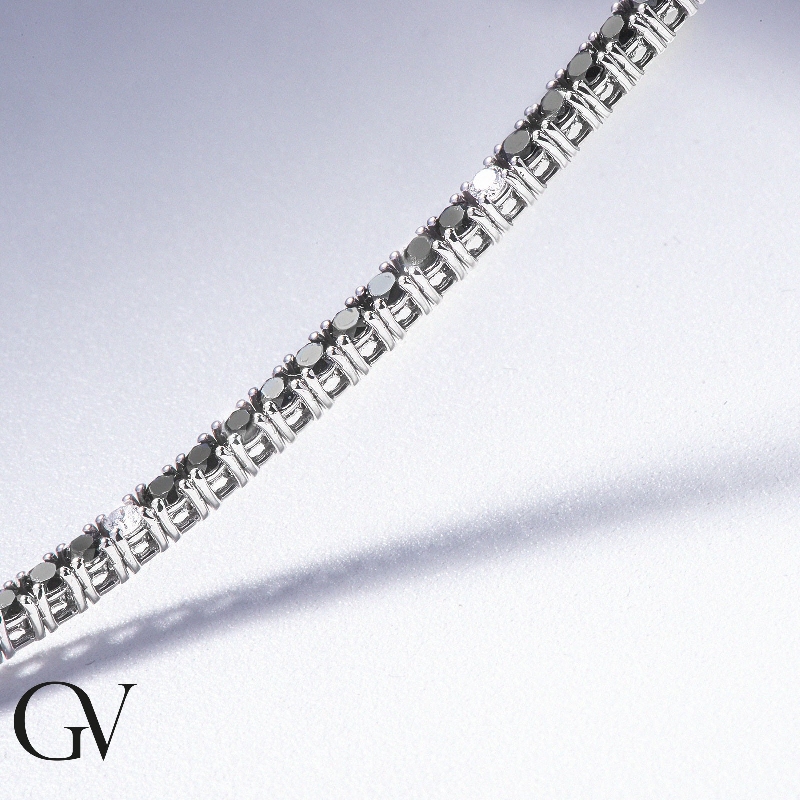 Elegant tennis bracelet with black and white diamonds