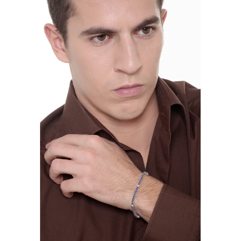 Wire style tennis bracelet with alternated sapphires and round cut diamonds