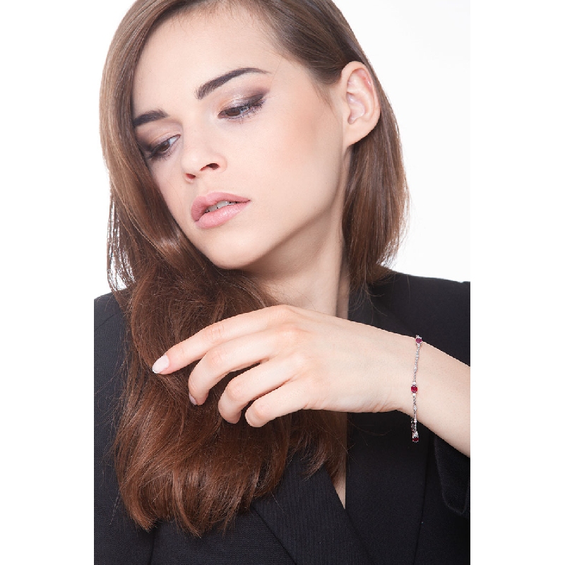 Alternate bracelet in white gold 18k with diamonds and 4 rubies oval cut