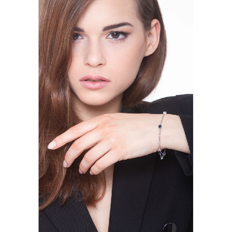 18k white gold alternate bracelet with diamonds and 4 blue sapphires 