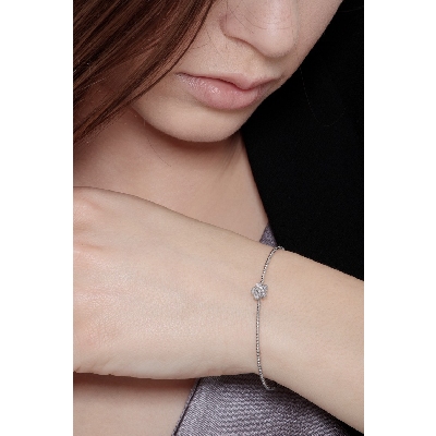 18k white gold rigid bracelet with spheres and flower with diamonds
