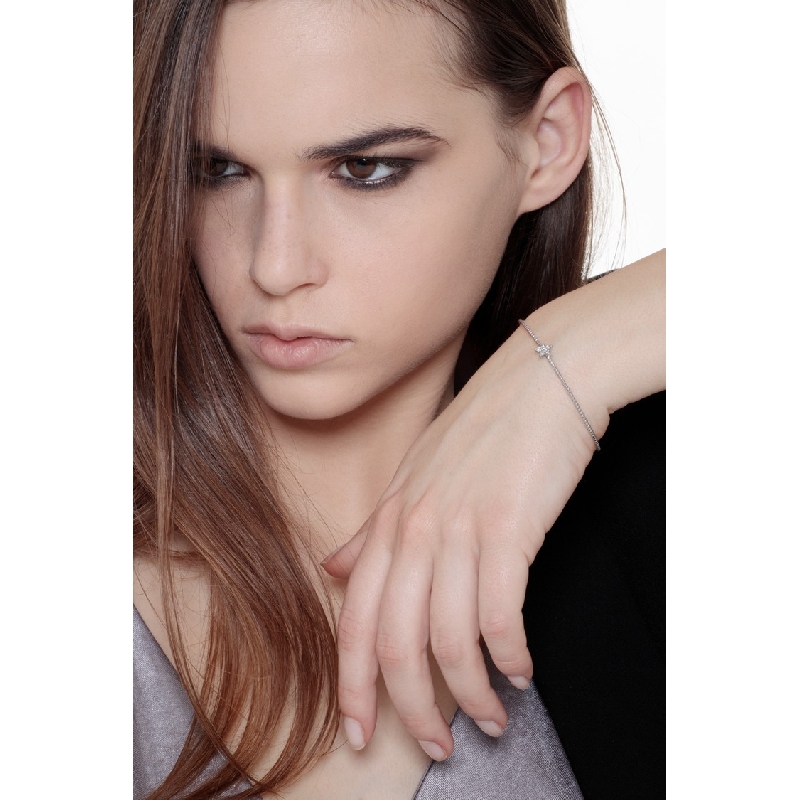 18k white gold rigid bracelet with spheres and star with diamonds