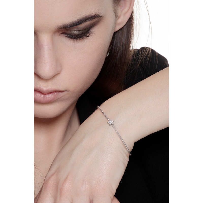 18k white gold rigid bracelet with spheres and star with diamonds