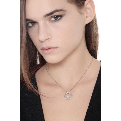 18k white gold necklace with a three circle pendant with a heart 