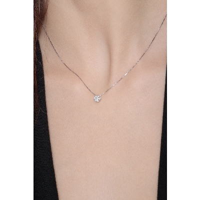 18k white gold solitaire necklace with diamond illusion pendant