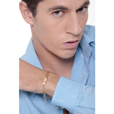 Bracciale con piastrina in oro giallo 18k