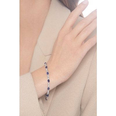 Bracciale alternato in oro bianco 18k con 12 zaffiri blu ovali e 36 diamanti, cm 18