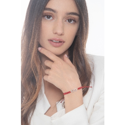 Red fabric cord bracelet with infinite charm in white gold 18k and diamonds