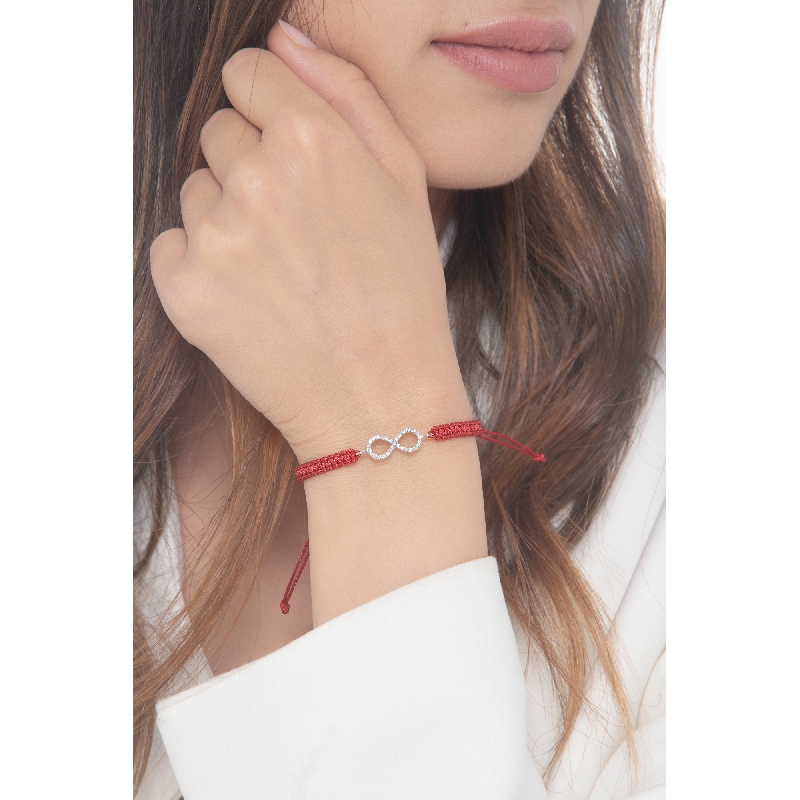 Red fabric cord bracelet with infinite charm in white gold 18k and diamonds
