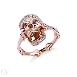 Anello teschio in oro rosa 18k con diamanti bianchi e neri GV