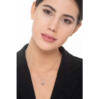 Skull pendant with black and white diamonds