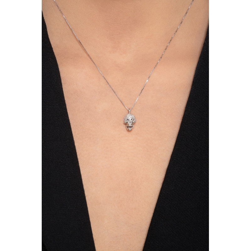 Skull pendant with black and white diamonds