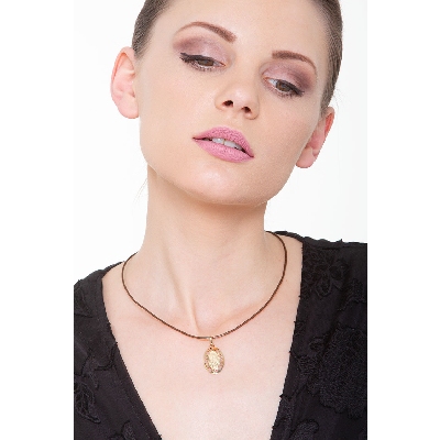 Medaglia sacra Madonna con bimbo in oro giallo 18k.