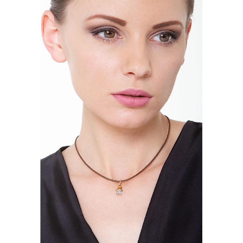 18k yellow gold child pendant with cubic zirconia